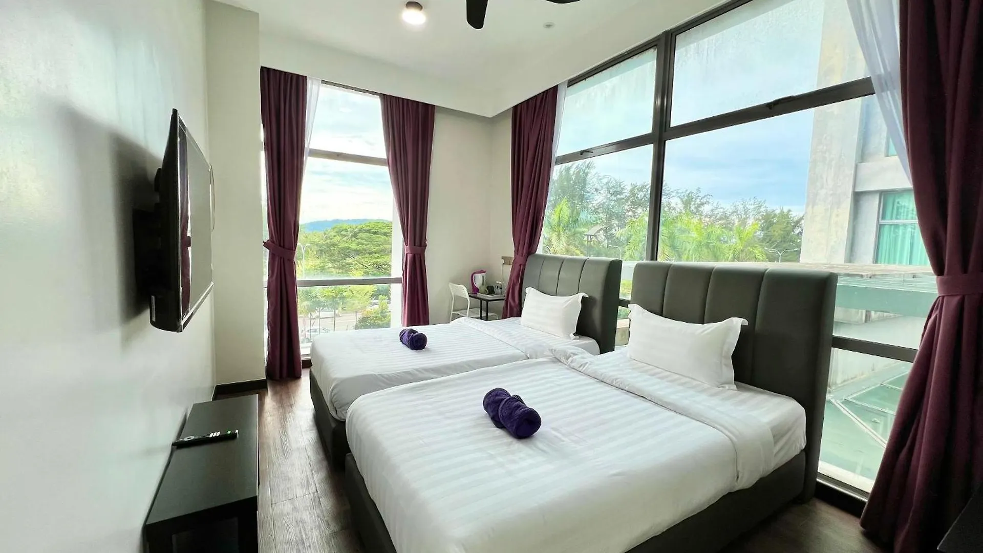 New Margo Hotel Kk contacts